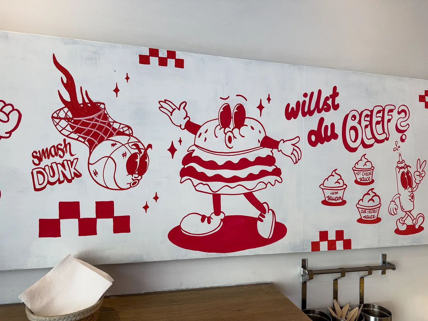 Comic-Charakter und Slogan im Smashly Innenraum