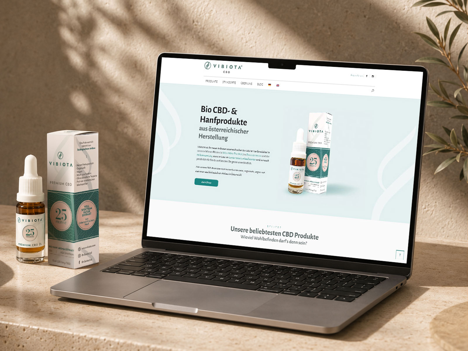 VIBIOTA Webdesign Mockup auf einem Laptop neben Produktverpackung